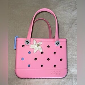 Pink Bog Bitty Bag with flower charm and water bottle holder
